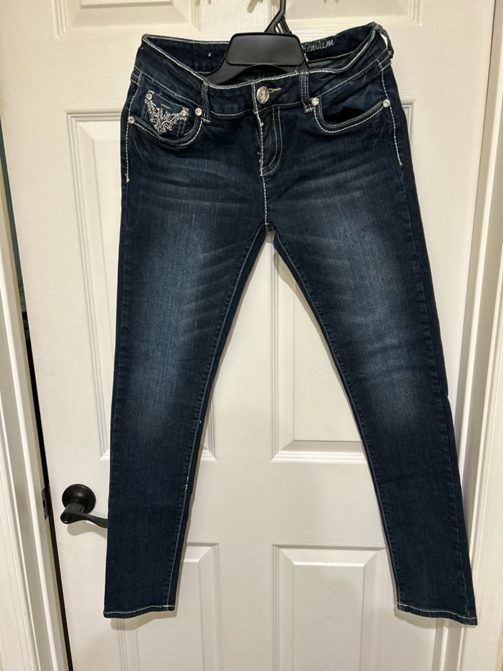 Dark Indigo Women’s Skinny Jeans with Embroidered Pockets and Rhinestone Accents